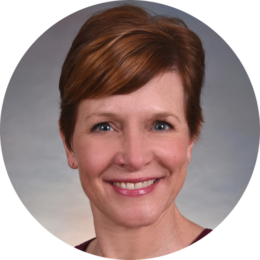 Headshot of EVALCORP team member Carla Wilson