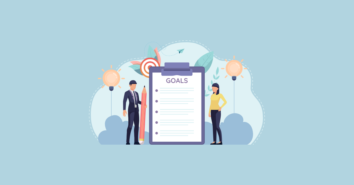Illustration of a purple clipboard with a sheet of white paper with the title 'GOALS' and bullet points underneath with lines to imply bulleted content. Flanking each side of the clipboard are illustrations of two faceless human figures roughly one-third the size of the clipboard, from left to right, a dark haired man in a dark suit holding a pinkish colored pencil that is nearly the same size as the figure; a dark haired woman in dark pants and a yellow sweater. This image is circular and the background contains peach colored light bulb shaped balloons, a target shape partially obscured by the clipboard, a paper airplane with preceding dashes implying flight, and various plant foliage and cloud shapes in various hues of blue, teal, and pink