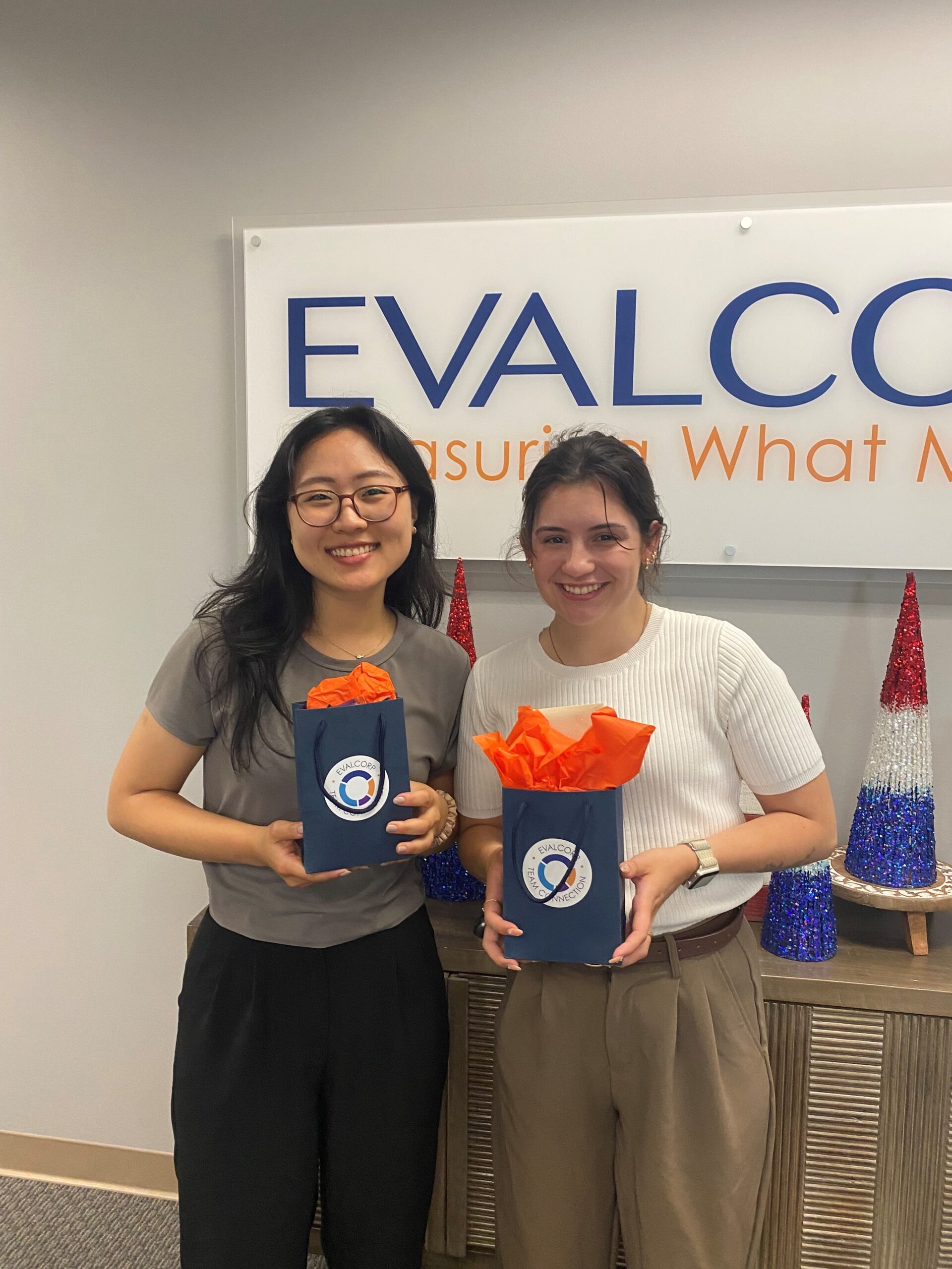 Yerin and Reighan smiling with their goodie bags
