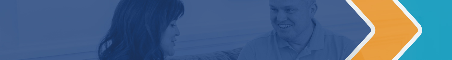 Photograph of two people facing each other. Overlain over this image is a large area of transparent blue, a smaller area of transparent orange, and a shape of transparent teal roughly the same area as the orange