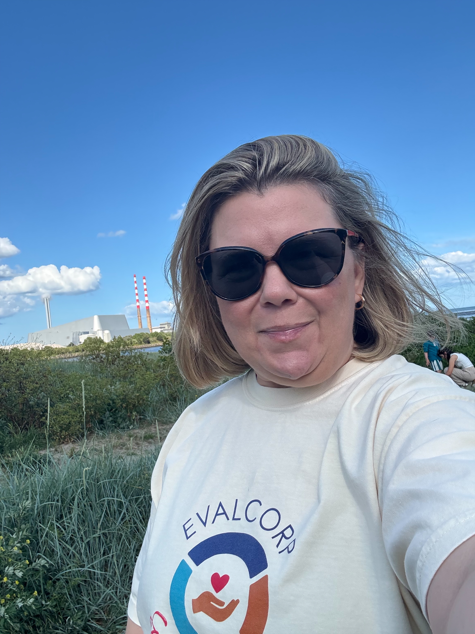 Shannon smiling at her local beach
