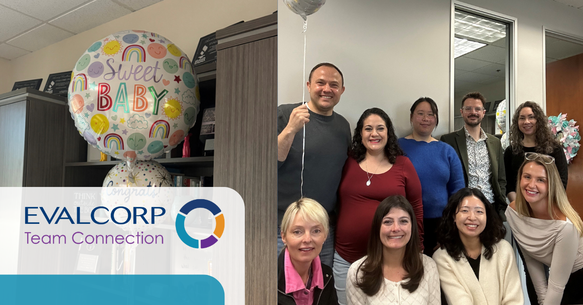 Celebratory baby shower featuring balloons and a group photo of the EVALCORP team, with a “Team Connection” banner and EVALCORP logo included.